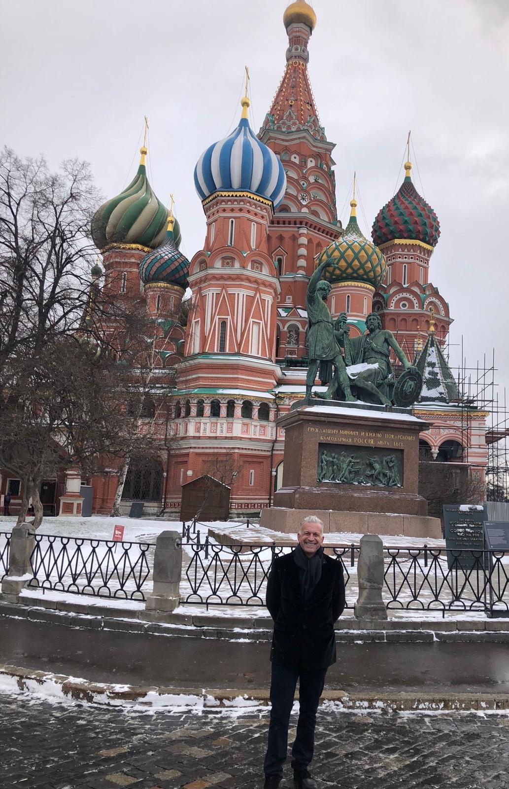 Dylan Ratigan standing in Red Square in Moscow in front of Saint Basil’s Cathedral.